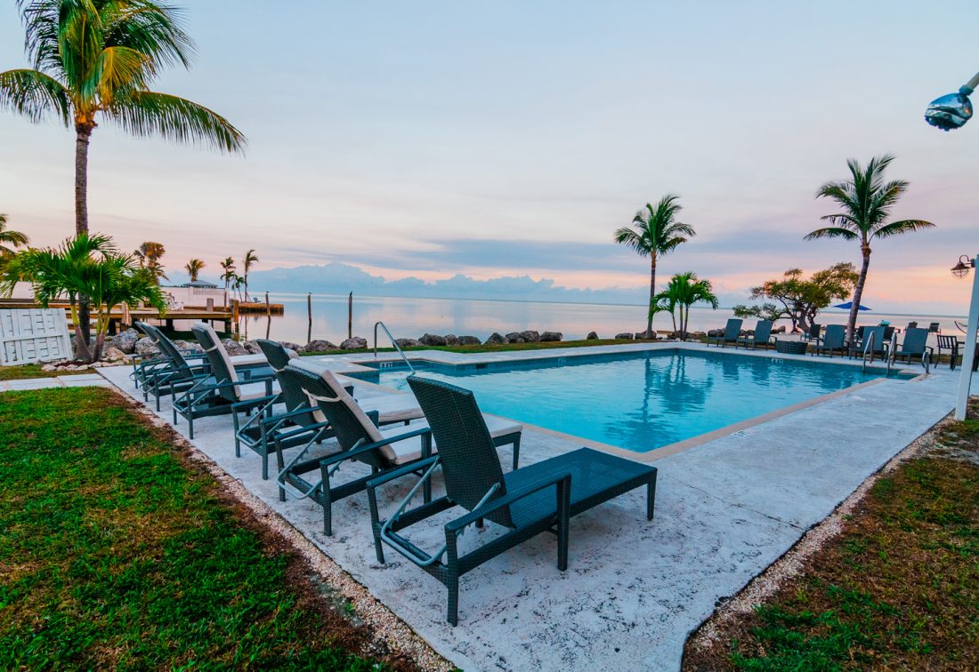 Seascape Resort pool surrounded by palms in Marathon